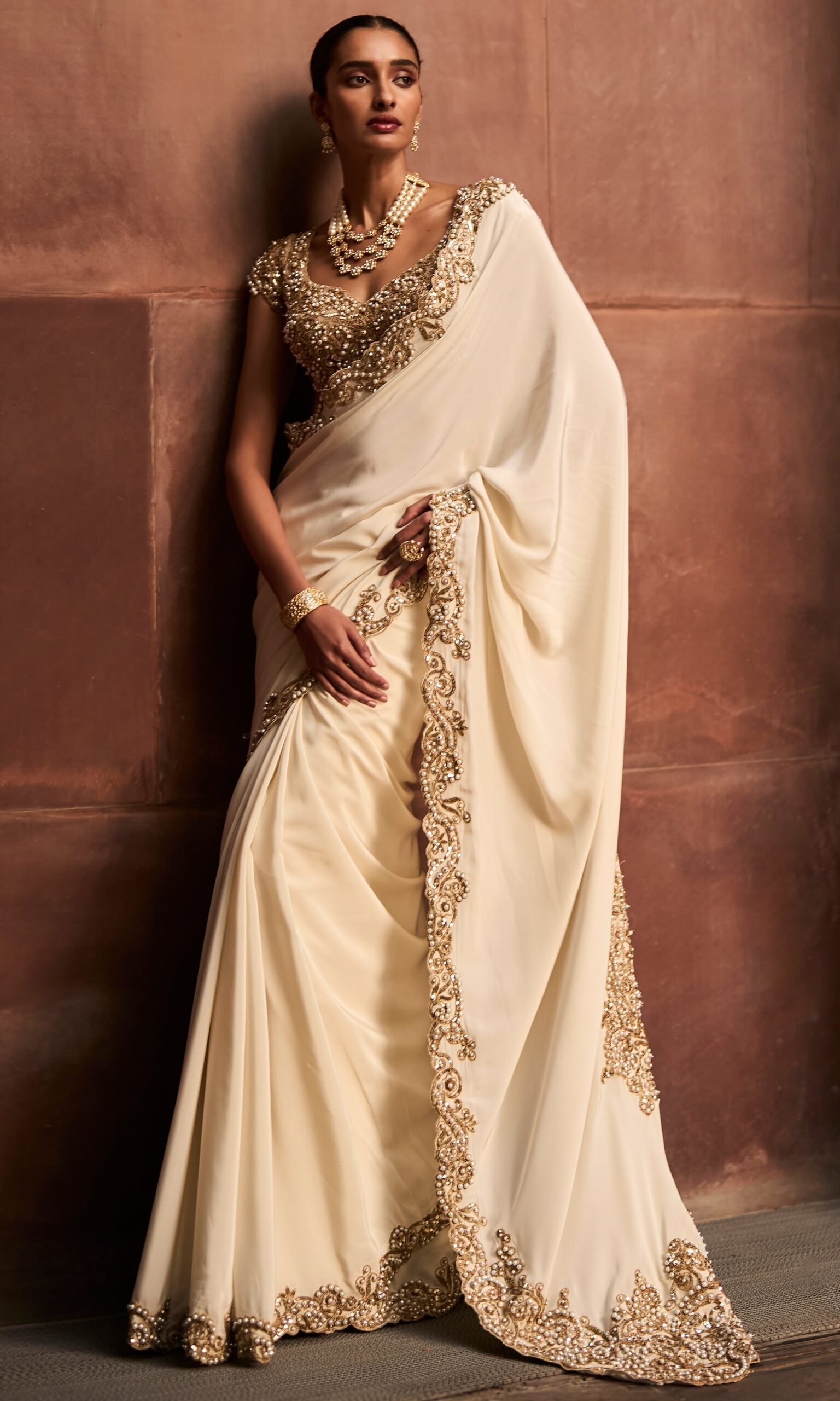 10_c3cda448-a5e3-46ea-aced-7a762838a331.jpg Ivory Gold Saree Set - Image 1