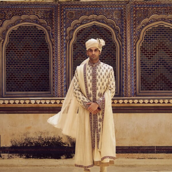Beige Raw Silk Sherwani with a Cotton Silk Choga and Churidar