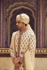 Beige Raw Silk Sherwani with a Cotton Silk Choga and Churidar - Image 2
