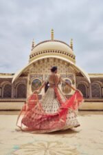 Gold Tissue Lehenga Choli with a Peach Tissue Dupatta - Image 2