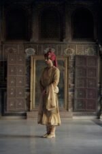 Gold Matka Silk Angrakha Style Sherwani with a Chanderi Booti Choga and Churidar