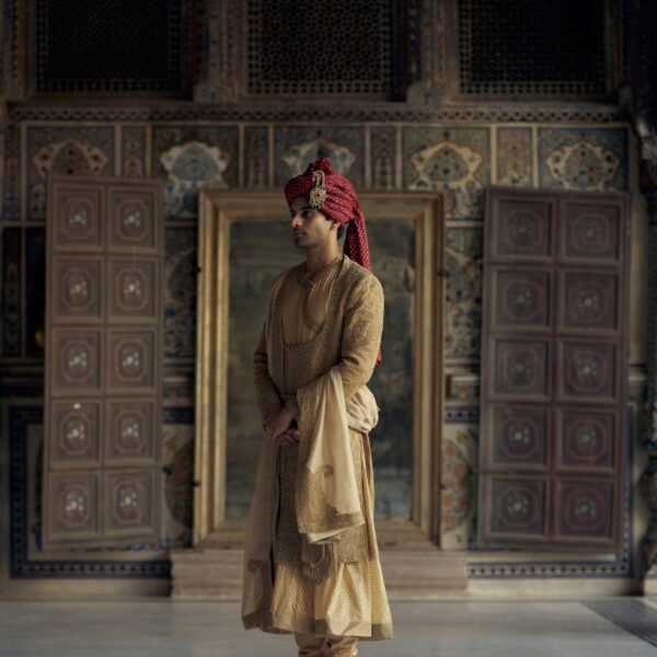 Gold Matka Silk Angrakha Style Sherwani with a Chanderi Booti Choga and Churidar