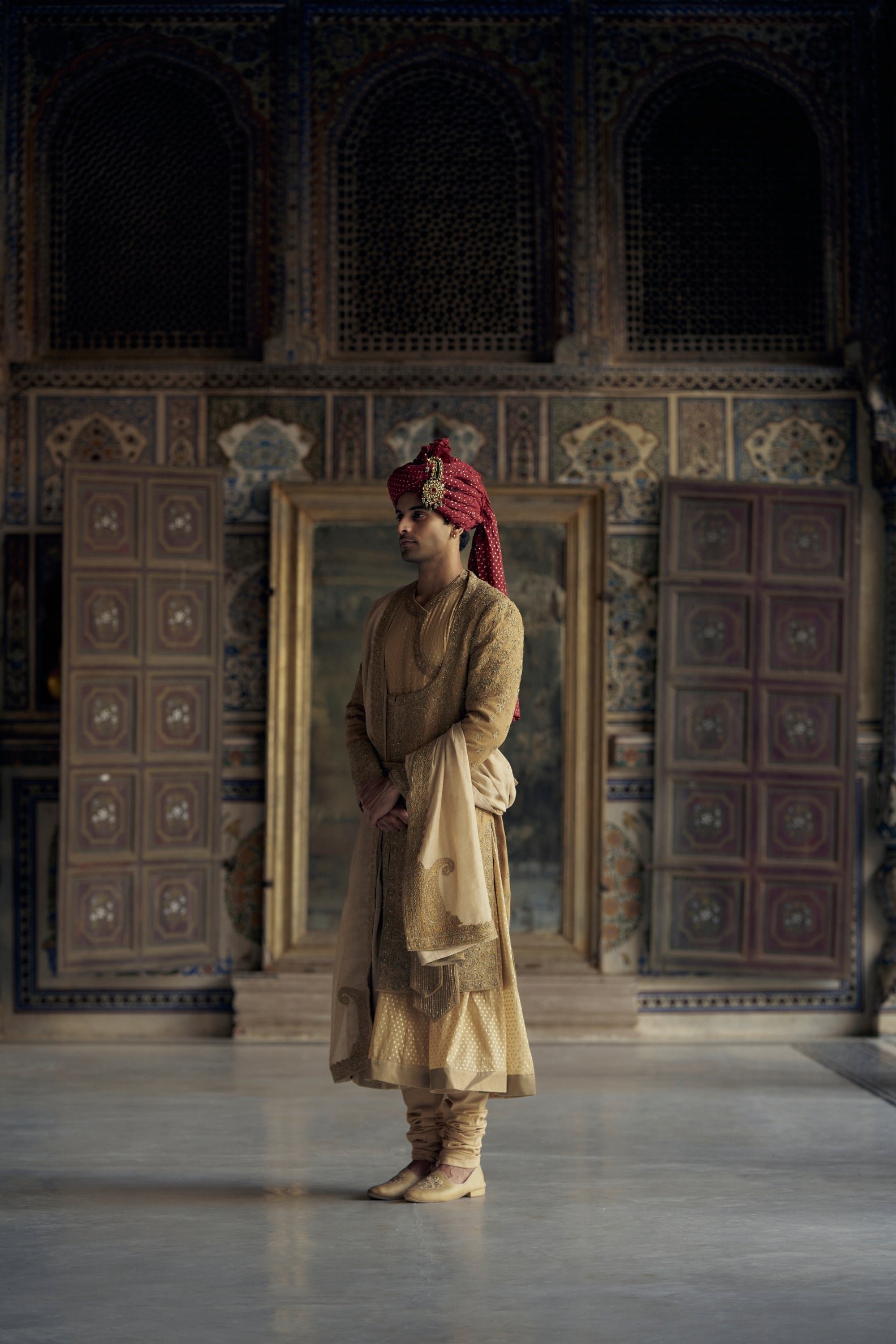 Nitika_Gujral_3308.jpg Gold Matka Silk Angrakha Style Sherwani with a Chanderi Booti Choga and Churidar - Image 1