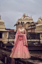 Rose Pink Raw Silk Lehenga Choli with Net Dupatta